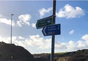 Public bridleway sign pointing in the direction of Brotton and Staithes.