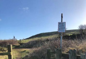 Countryside and wooden fences along the Saltburn walking route.
