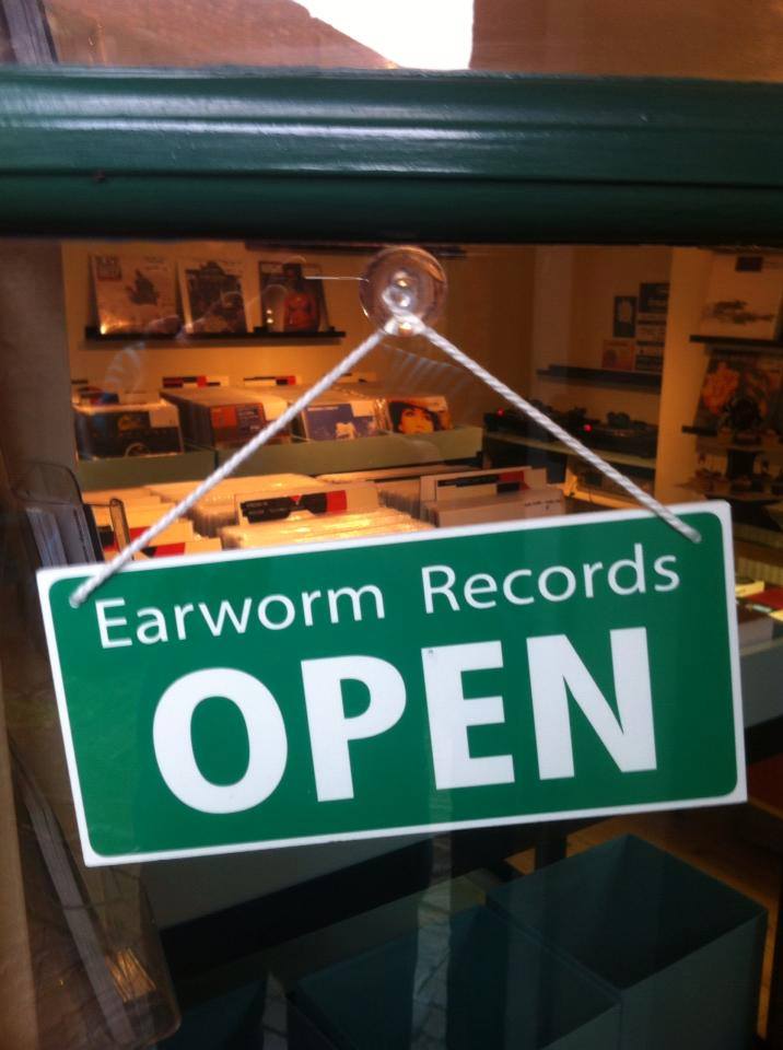 Earworm records shop open sign