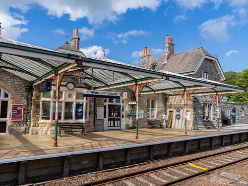 Exterior shot of Grange-over-Sands train station in the daytime