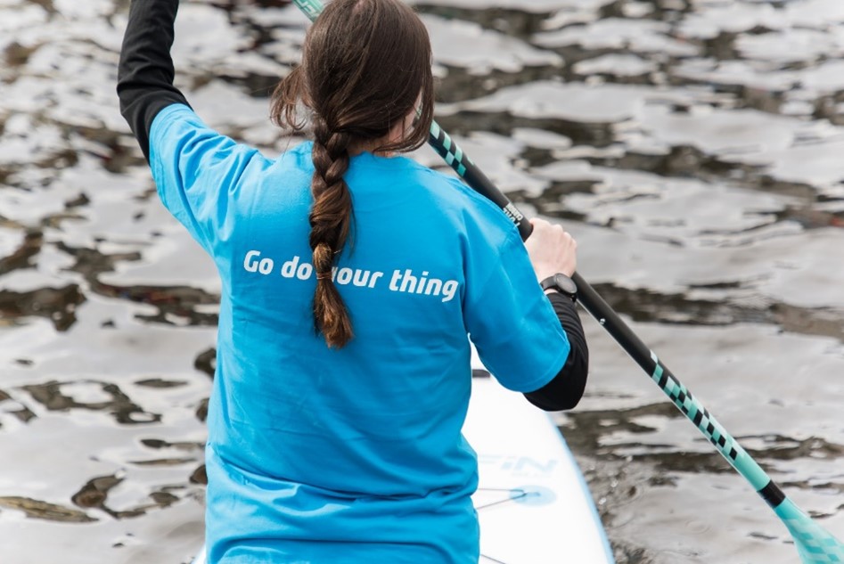 Image of a paddleboarder on Leeds dock