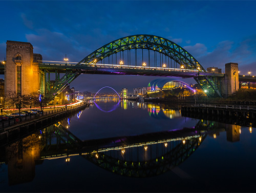 Newcastle Bridge lit up at night