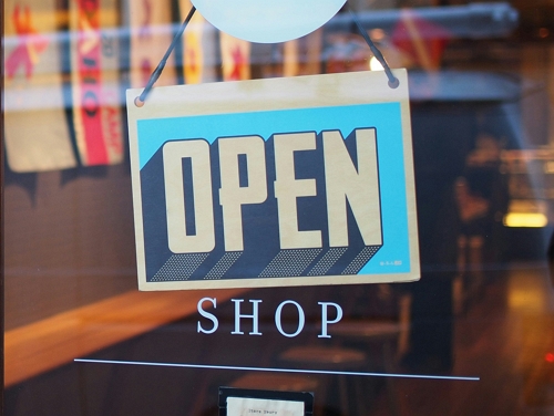 Shop sign saying open
