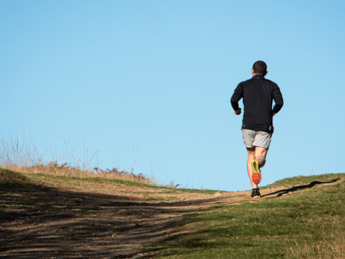 Man running up a hill