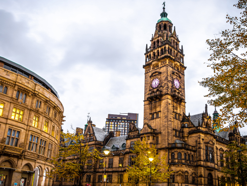 Sheffield Town Hall and surrounding city-centre buildings on an autumn day.
