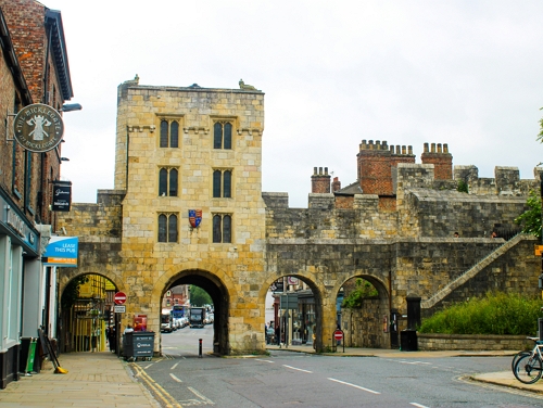 York city walls at a section where you can walk beneath them.