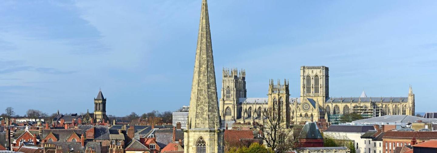 York minster and surrounding buildings on a sunny day