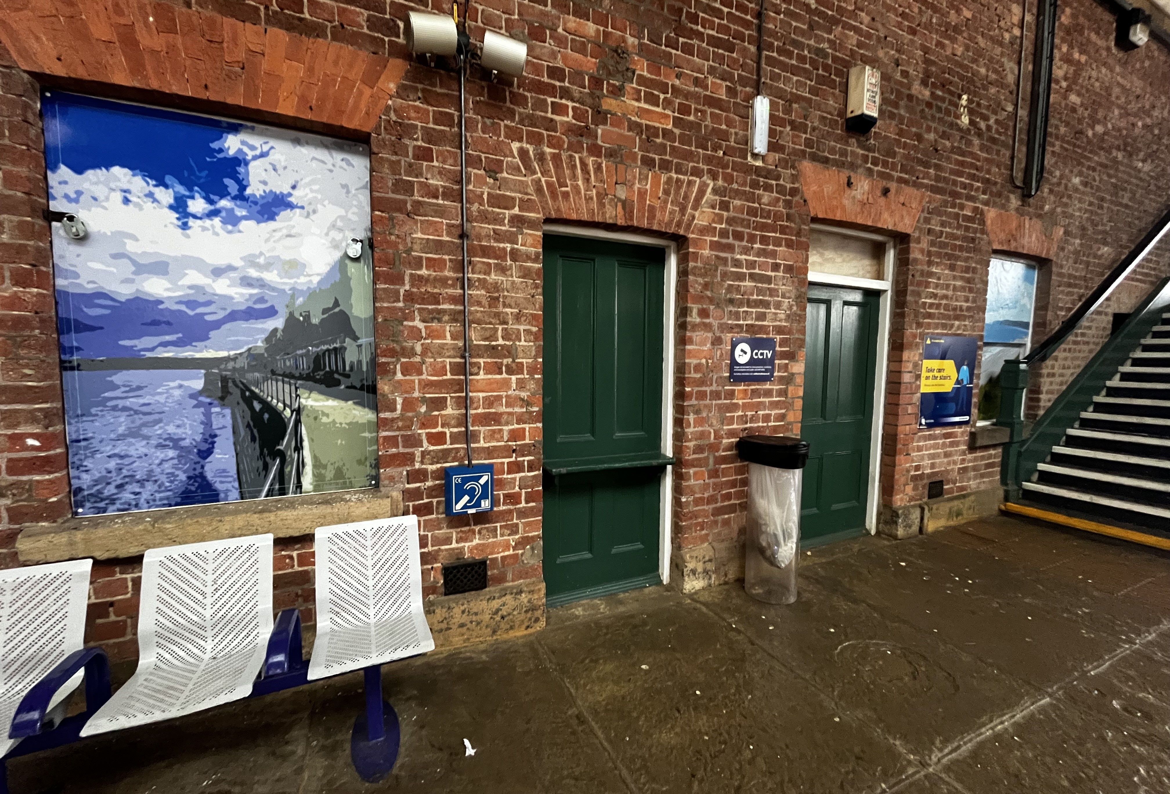 this-image-shows-some-of-the-artwork-at-filey-station