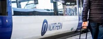 Image shows Northern train at platform with customer on the platform image-shows-northern-train-at-platform-with-customer-on-the-platform