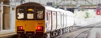 Image shows Northern train departing a station image-shows-northern-train-on-approach-to-station