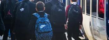 image-shows-schoolchildren-disembarking-a-northern-train
