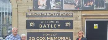 An image of Jo's parents Gordon and Jean and her sister Kim at the new memorial in Batley i7dgt-2g59p-e2frz-624ha-wtg2y