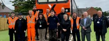 This images shows the Heaton team in front of the class 144 classroom this-images-shows-the-heaton-team-in-front-of-the-class-144-classroom