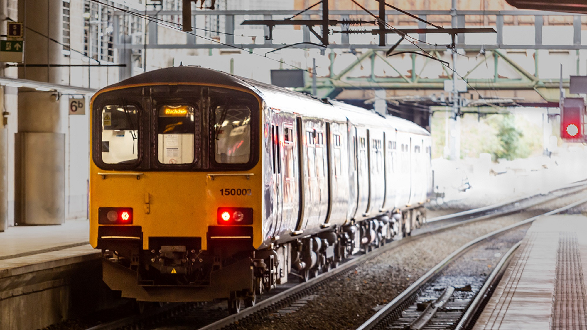 Image shows Northern train departing a station