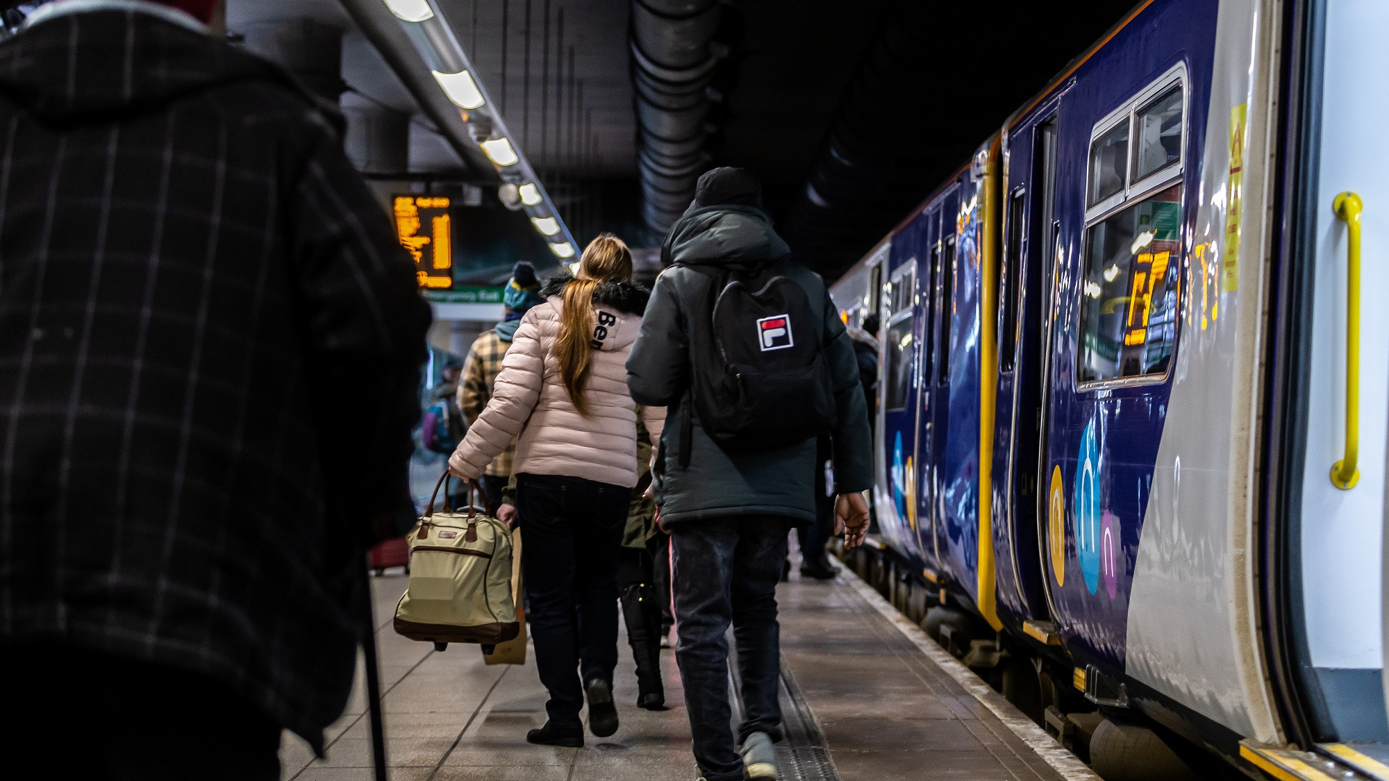 Image shows customers boarding Northern service