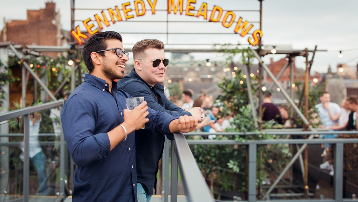 Image shows people enjoying city life