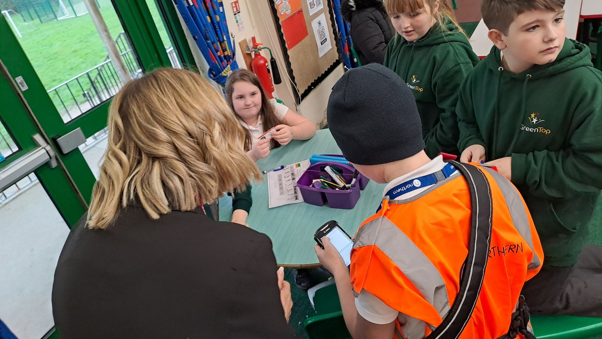 Image shows schoolchildren with Northern staff 2