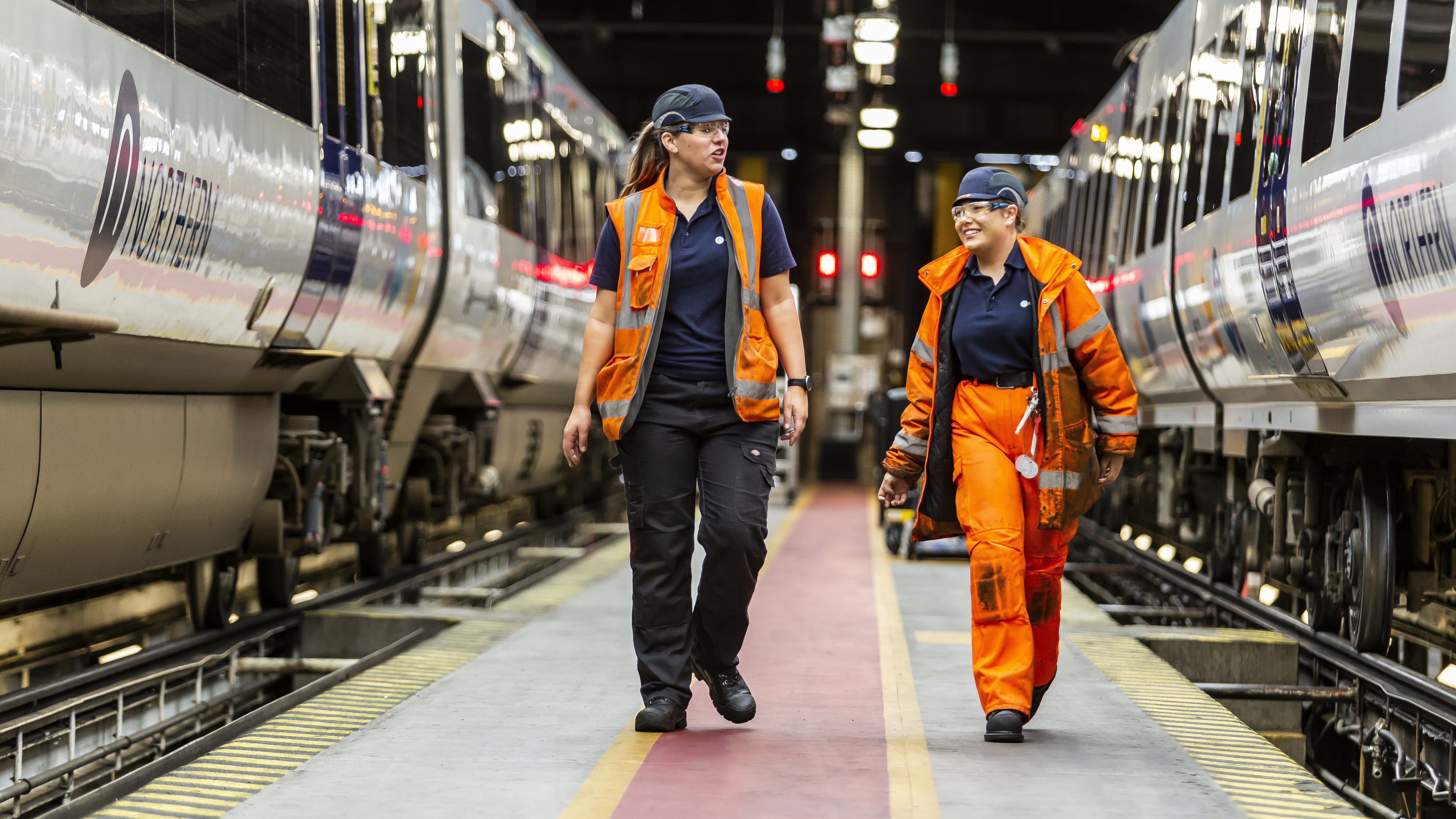 This image shows Kate Towns (L) with a colleague at Neville Hill depot