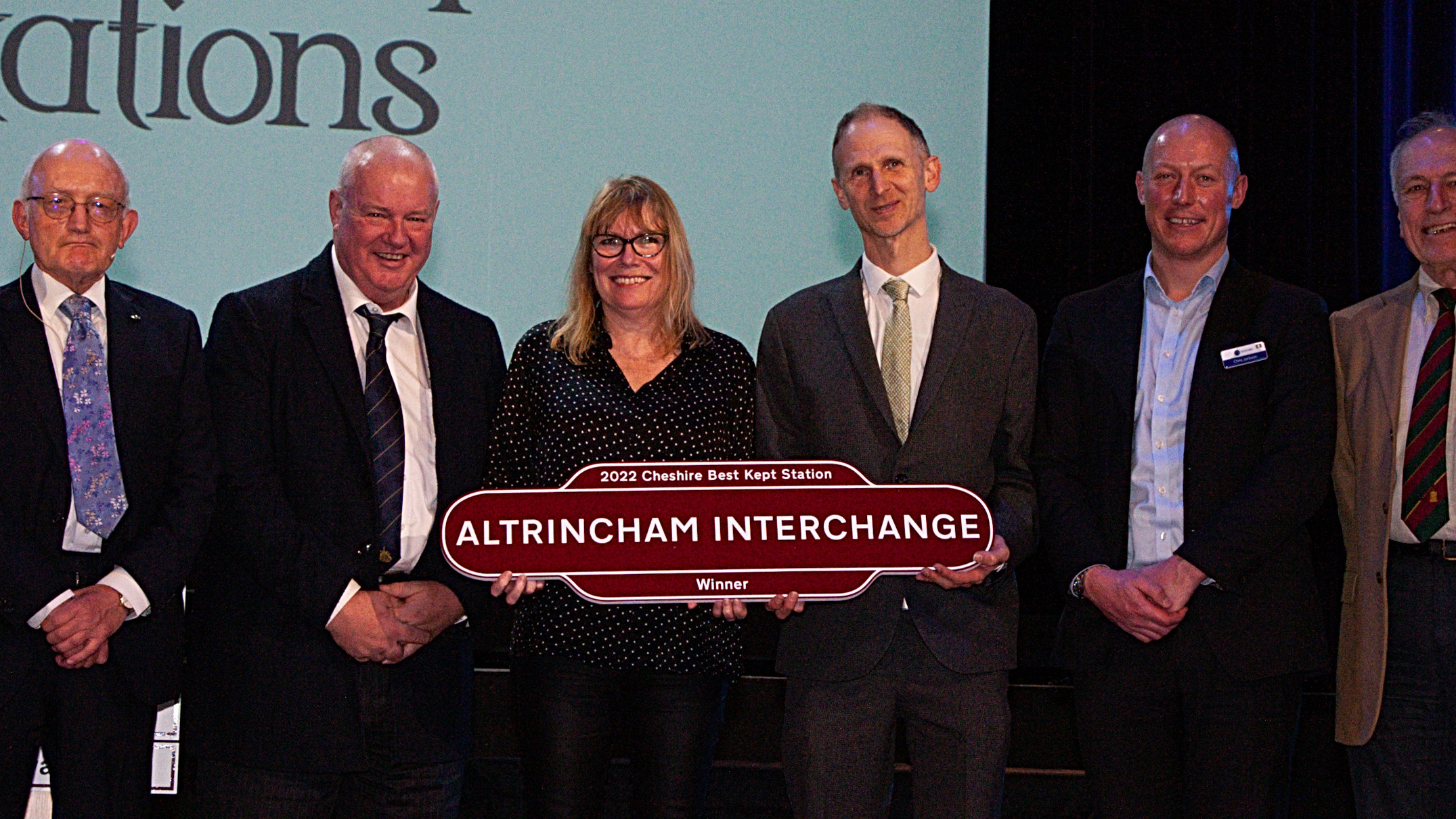 This image shows the Altrincham winners of the Best Kept Station