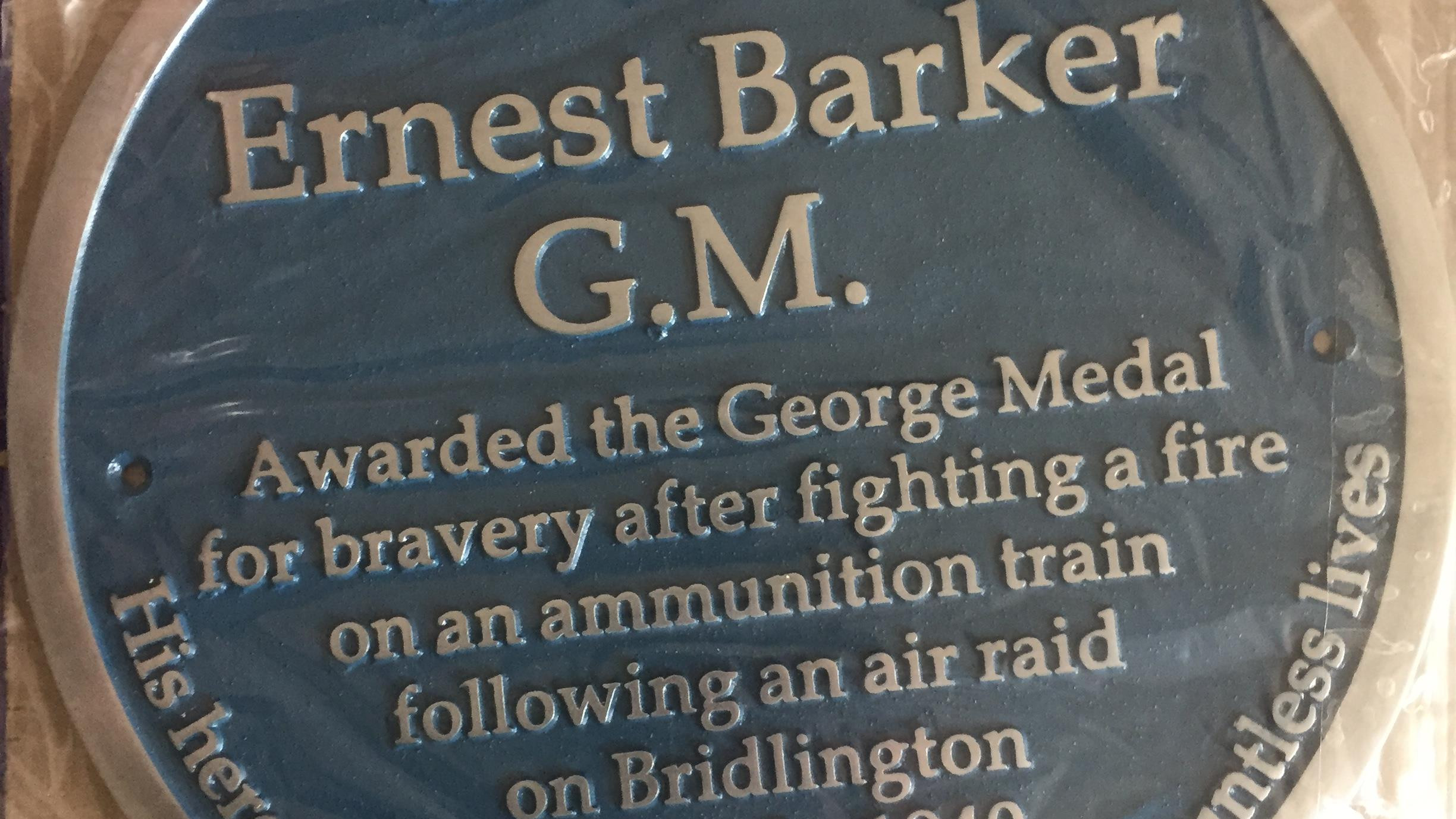 This image shows the blue plaque honouring Ernest Barker