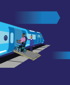 Illustration of wheelchair user and northern member of staff boarding accessible trian